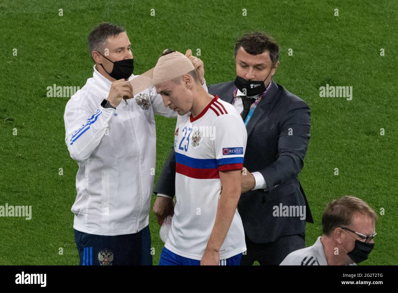 SAINT PETERSBURG, RUSSIA - JUNE 12: Daler Kuzyayev of Russia while receiving treatment during the UEFA Euro 2020 Championship Group B match between Belgium and Russia on June 12, 2021 in Saint Petersburg, Russia. (Photo by MB Media) Stock Photo