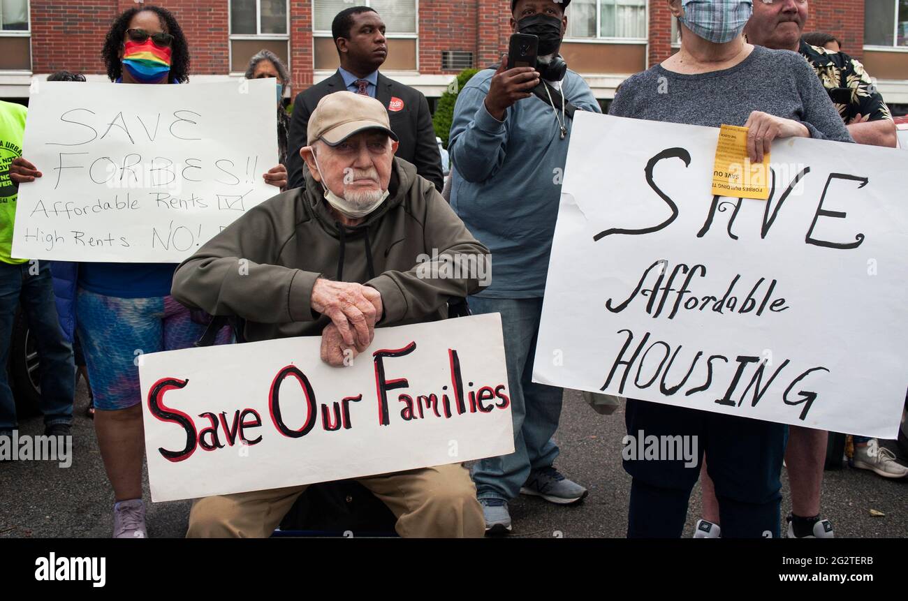 Boston, Massachusetts, USA, 12 June 2021.  About 75 residents and supporters demonstrated in front of the 147 unit Forbes Residential building In the Jamaica Plain area of Boston.  The building has a large number of senior and disabled tenants and the building owner has refused to sign an agreement that would preserve apartments for low-income renters. Stock Photo