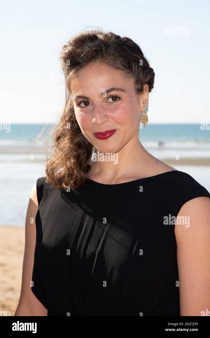 Laura Muller attending a Photocall on the beach as part of the