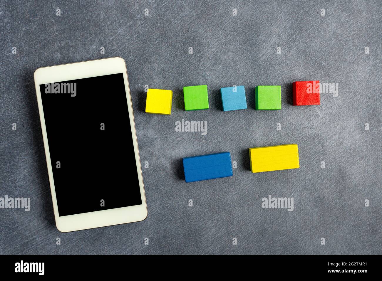 Stack of Sample Cube Rectangular Boxes On Surface Polished With Multi-Colour Stock Photo
