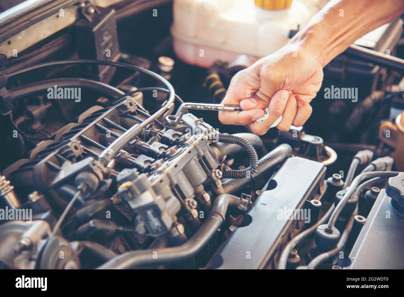 Mechanic Car Service in automobile garage auto car and vehicles service mechanical  engineering. Automobile mechanic hands car repairs automotive techn Stock  Photo - Alamy