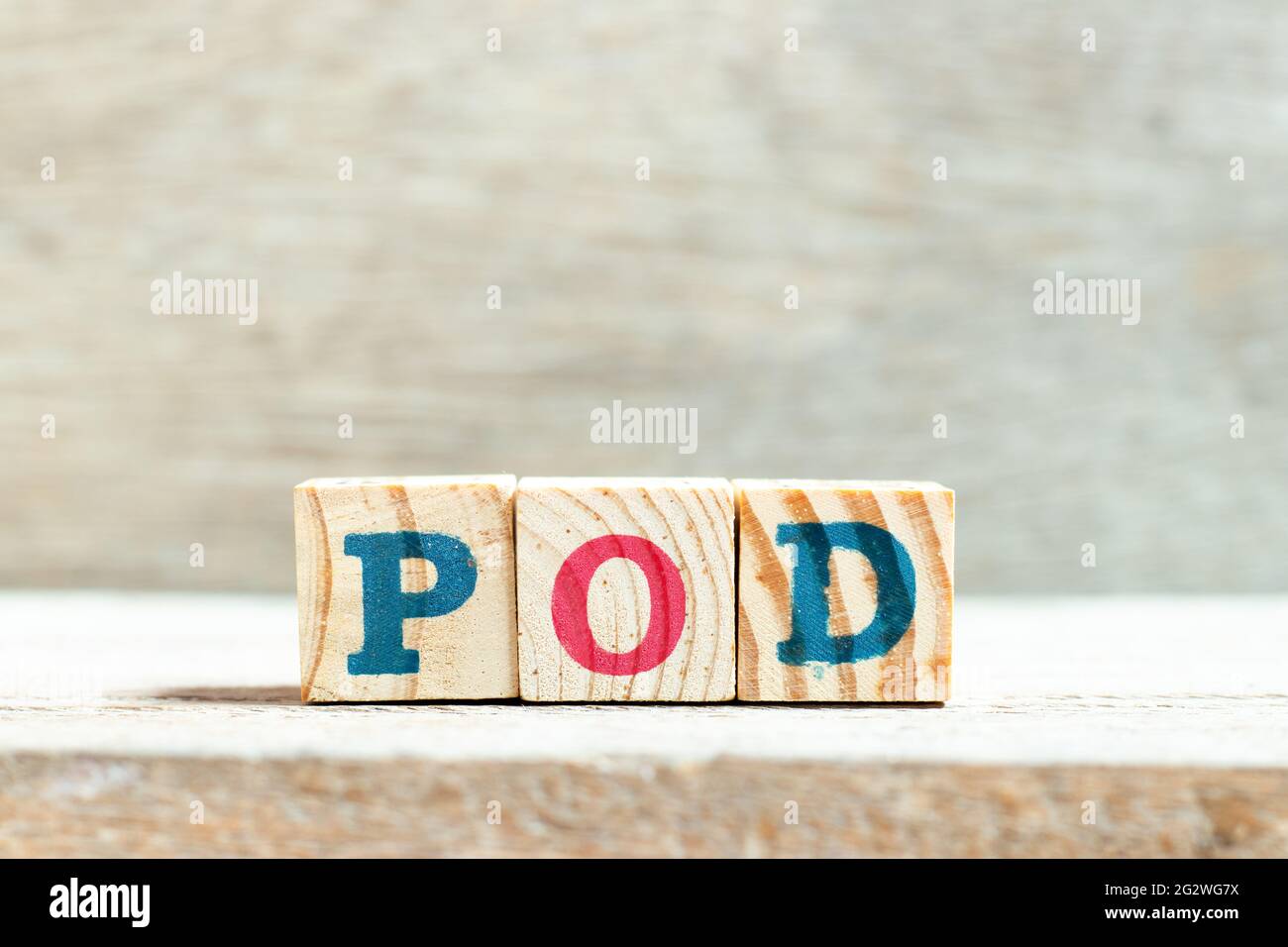 Alphabet letter block in word POD (Abbreviation of Proof of delivery, Point  of delivery, Pay on demand or Print on demand) on wood background Stock  Photo - Alamy