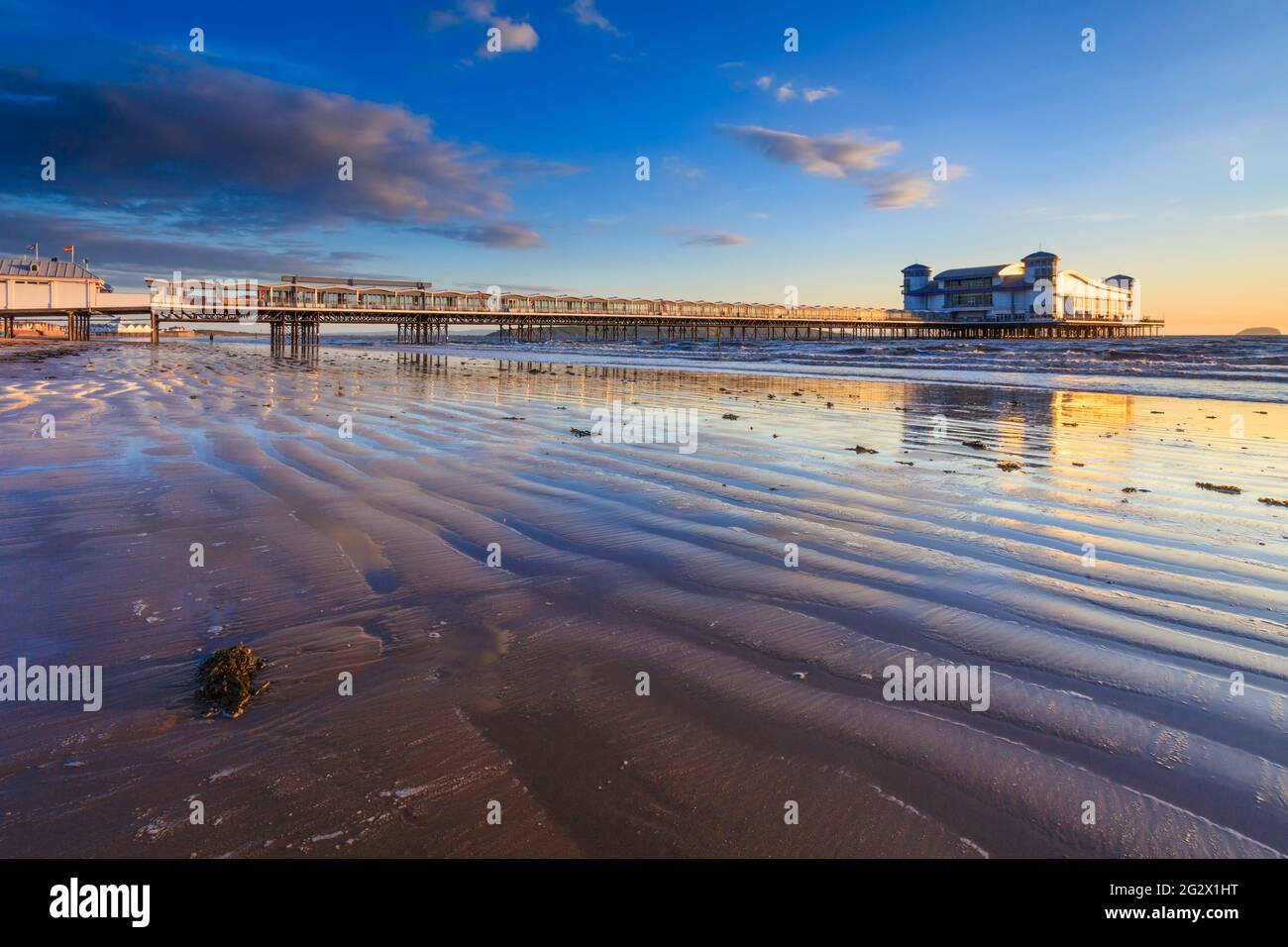 The recently rebuilt Grand Pier at Weston-Super-Mare captured shortly before sunset in May. Stock Photo
