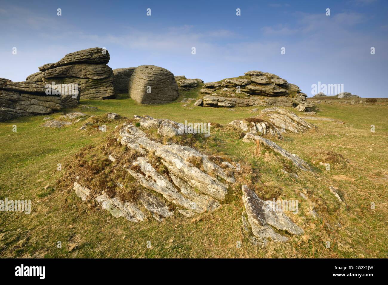 Tunhill Rocks in the Dartmoor National Park with Pil Tor in the distance. Stock Photo