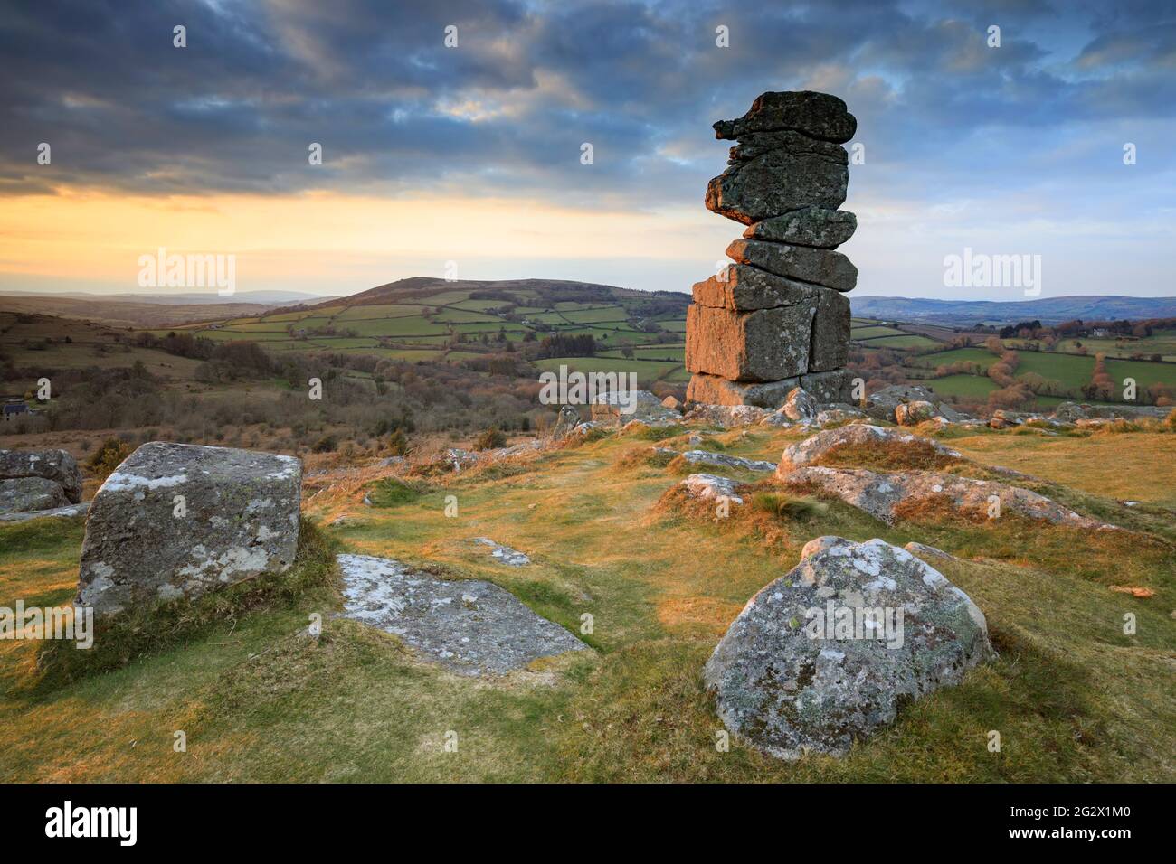 The Bowerman's Nose in the Dartmoor National Park illuminated by late evening sunlight. Stock Photo