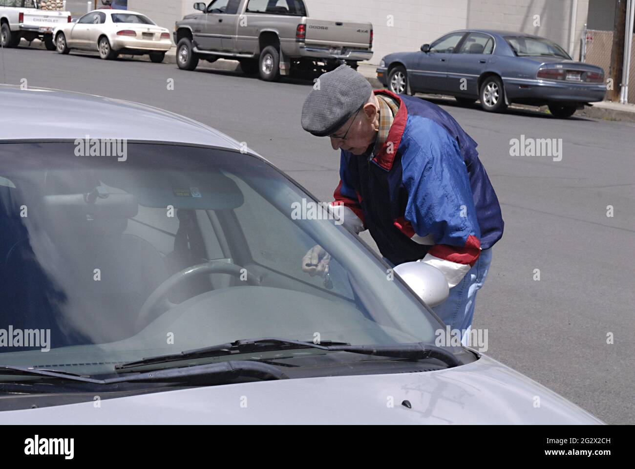 KAMIAH /IDAHO STATE /USA An ameican senior male opening his car door to