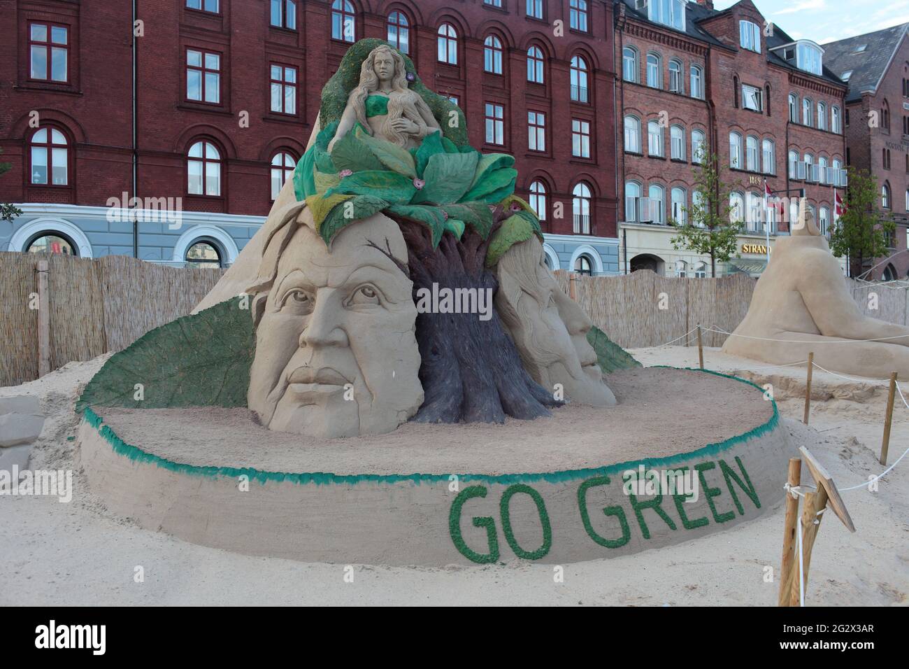 one of the most spectacular sand sculpture events, Copenhagen.  Prize winning 'Go green - Save the Earth' by Sudarsan Pattnaik Stock Photo