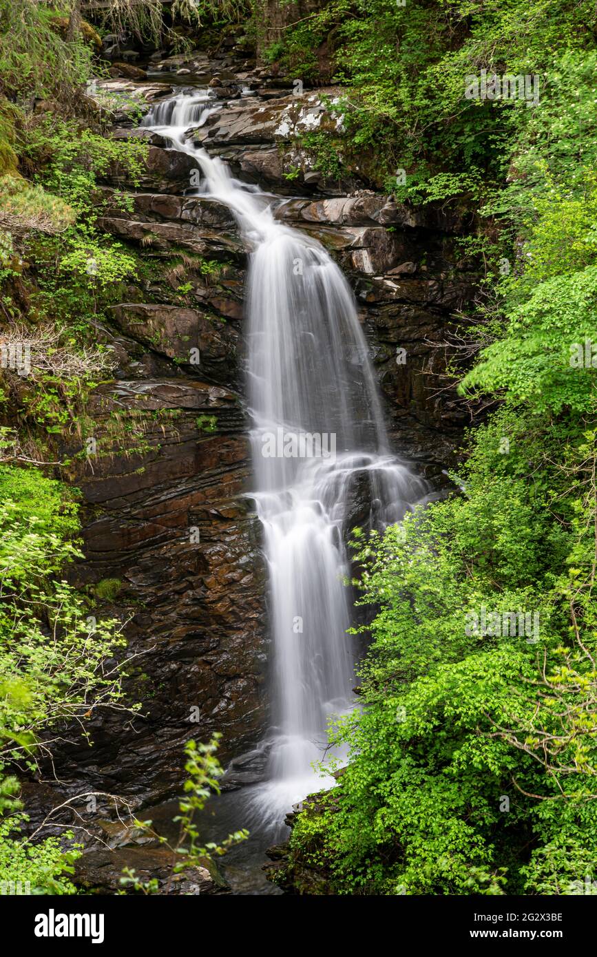 Photography of waterfall in forest, Aberfeldy, Scotland Stock Photo