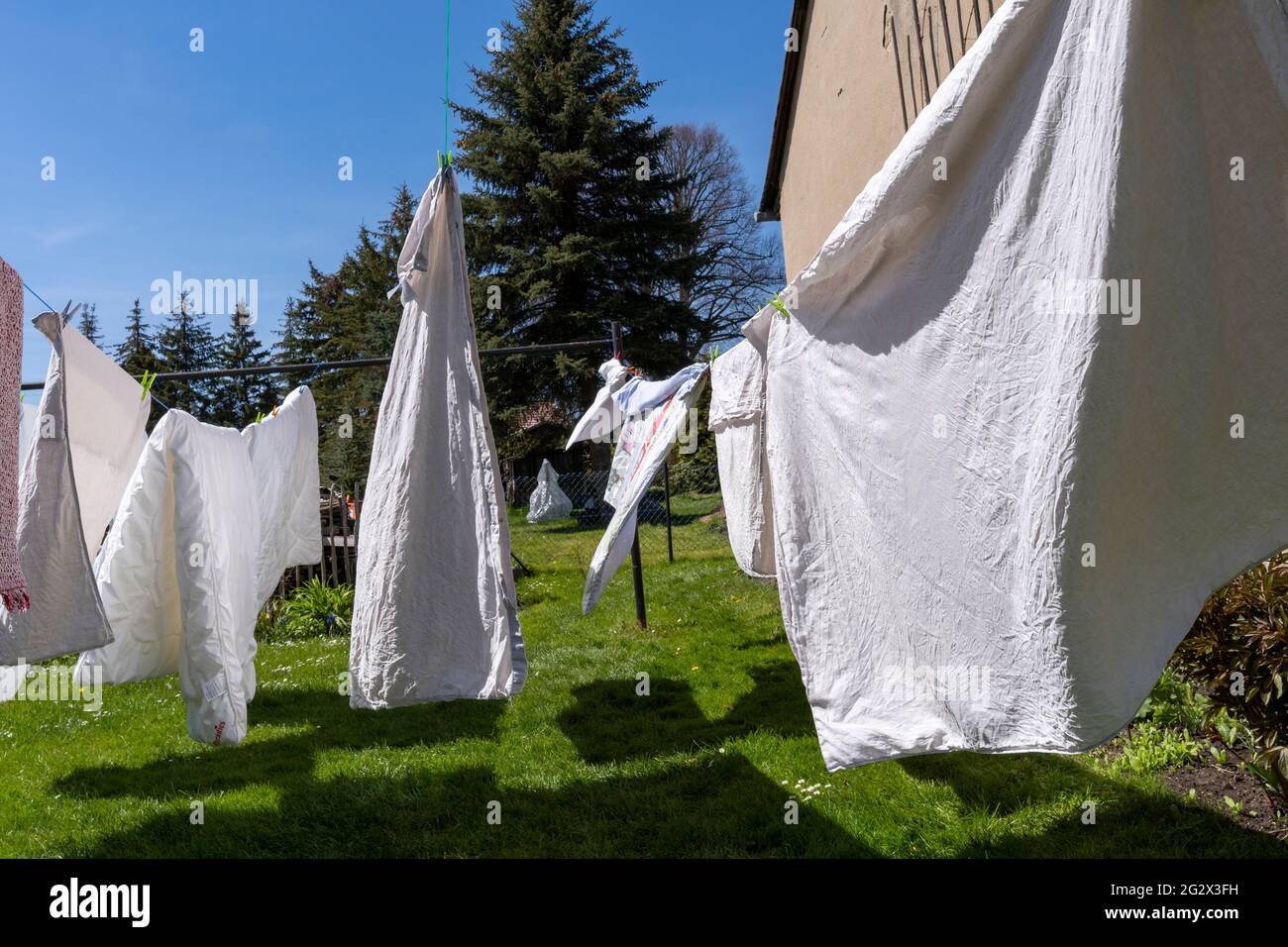 Laundry Drying On The Rope Outside Stock Photo