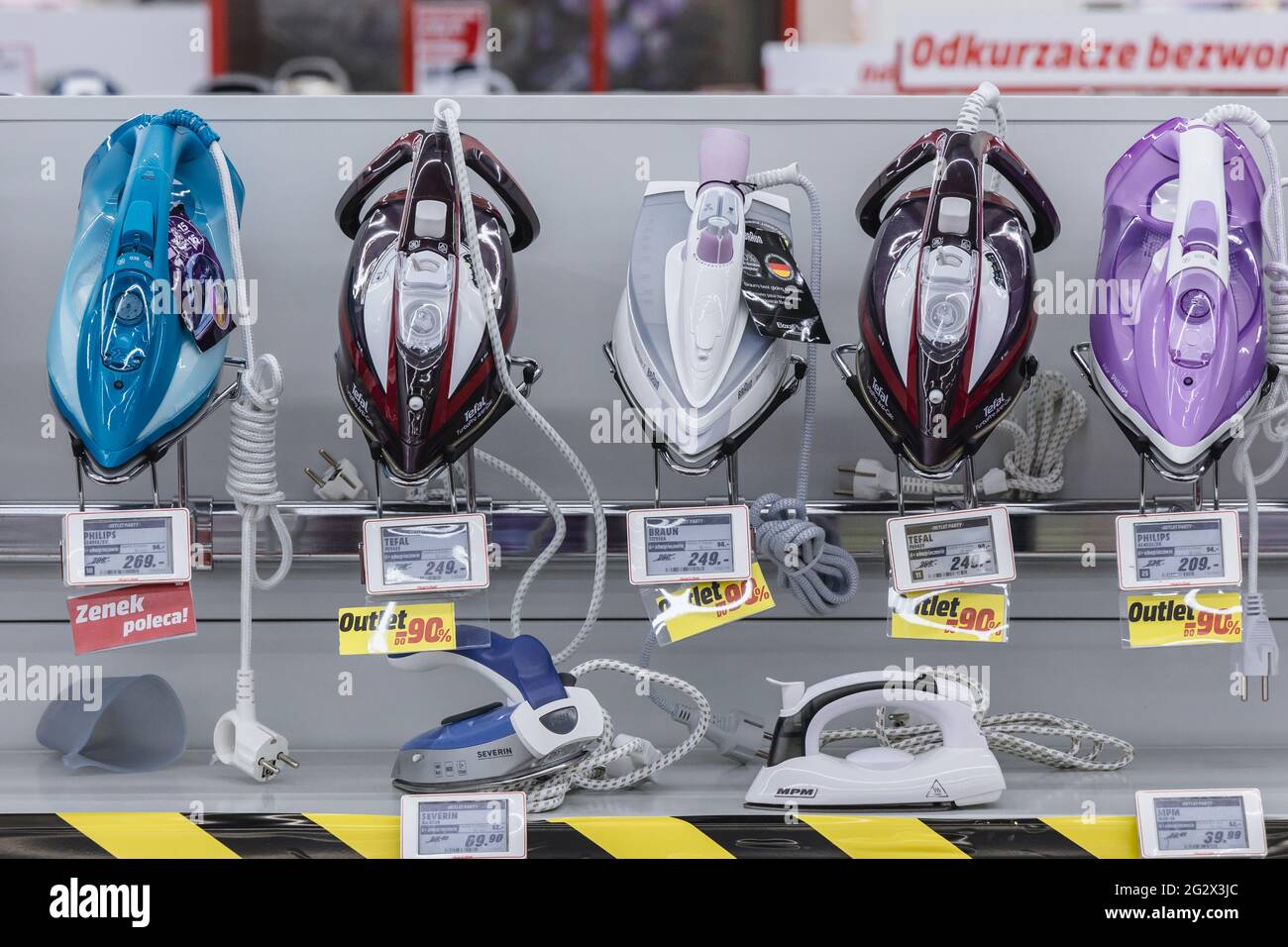 Irons in MediaMarkt store with household appliances and consumer electronics in Warsaw, Poland Stock Photo