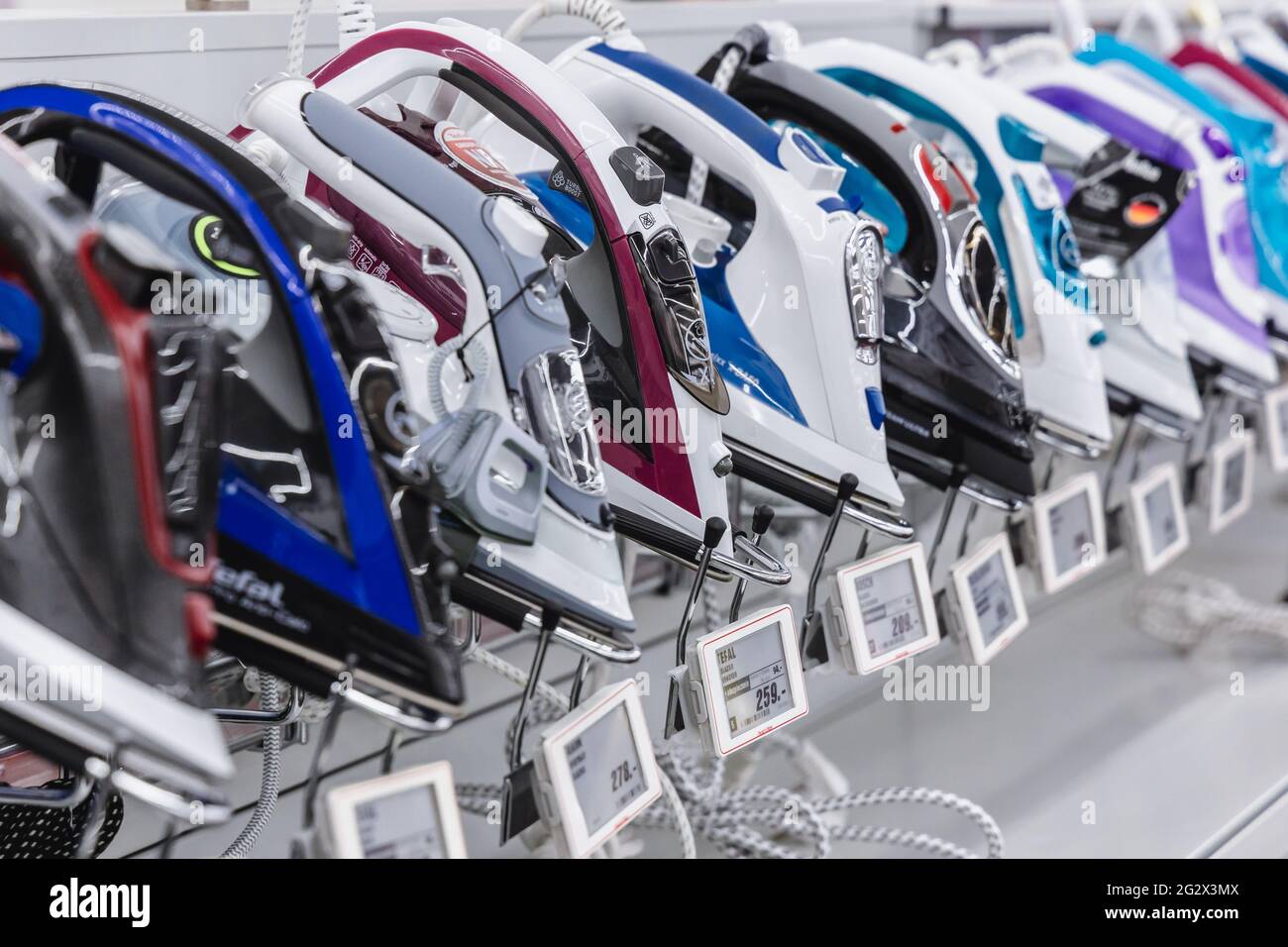 Irons in MediaMarkt store with household appliances and consumer electronics in Warsaw, Poland Stock Photo