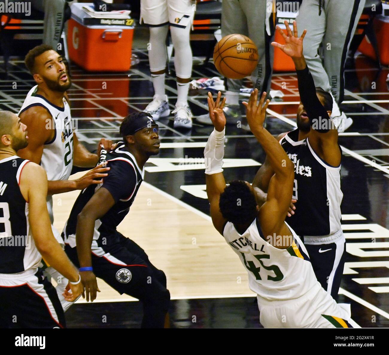 Los Angeles, Ca. 13th June, 2021. Utah Jazz guard Donovan Mitchell (45) loses control of the ball under pressure from Los Angeles Clippers guard Paul George (13) during the second half of Game 3 of the Western Conference second-round playoffs at Staples Center in Los Angeles on Saturday, June 12, 2021. The Clippers rallied to win another game 3, a 132-106 win over the Utah Jazz that cuts their deficit in this second-round series to 2-1 entering Monday's fourth game. Photo by Jim Ruymen/UPI Credit: UPI/Alamy Live News Stock Photo