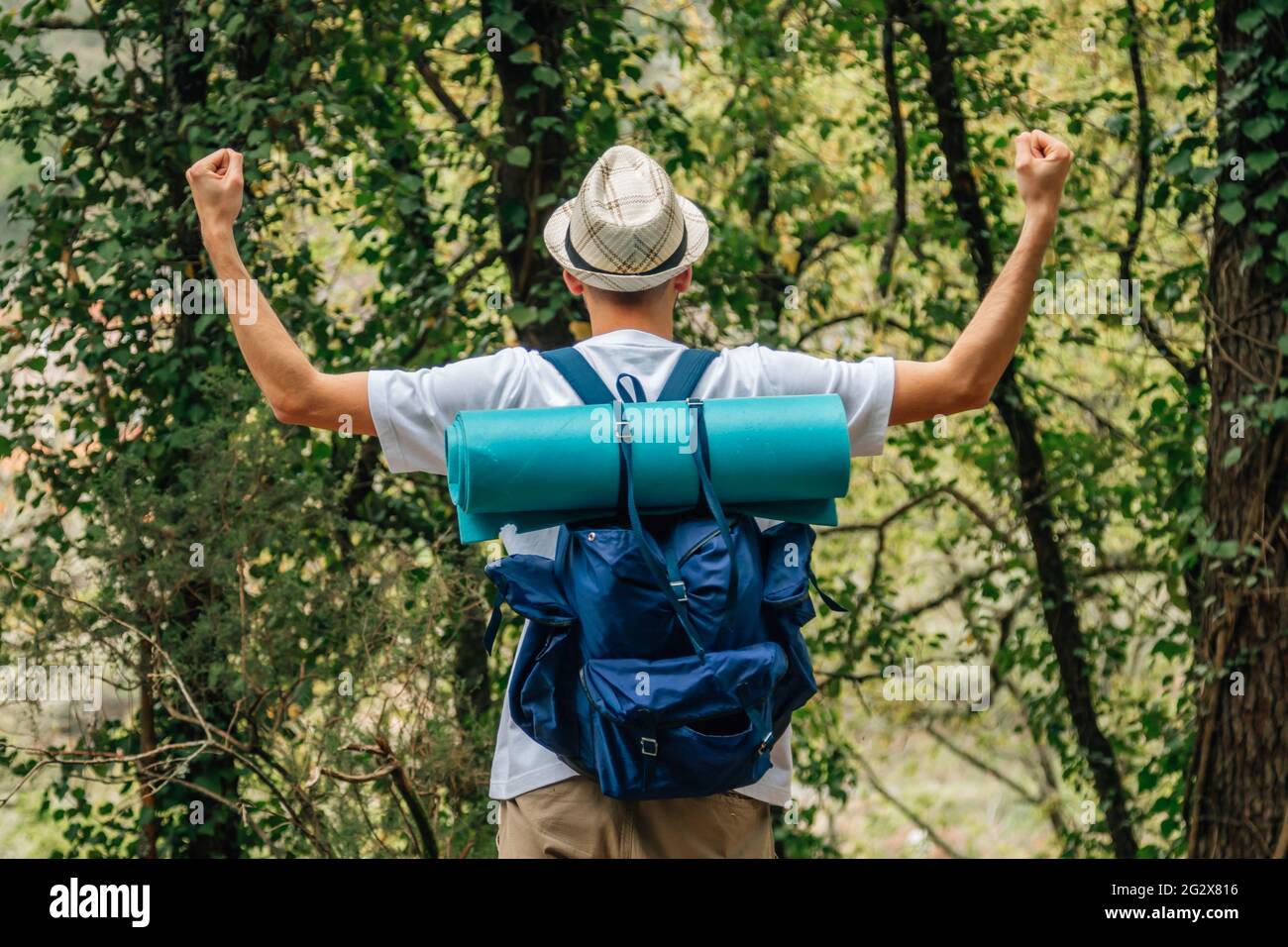Positive young hiker backpack hi-res stock photography and images - Alamy
