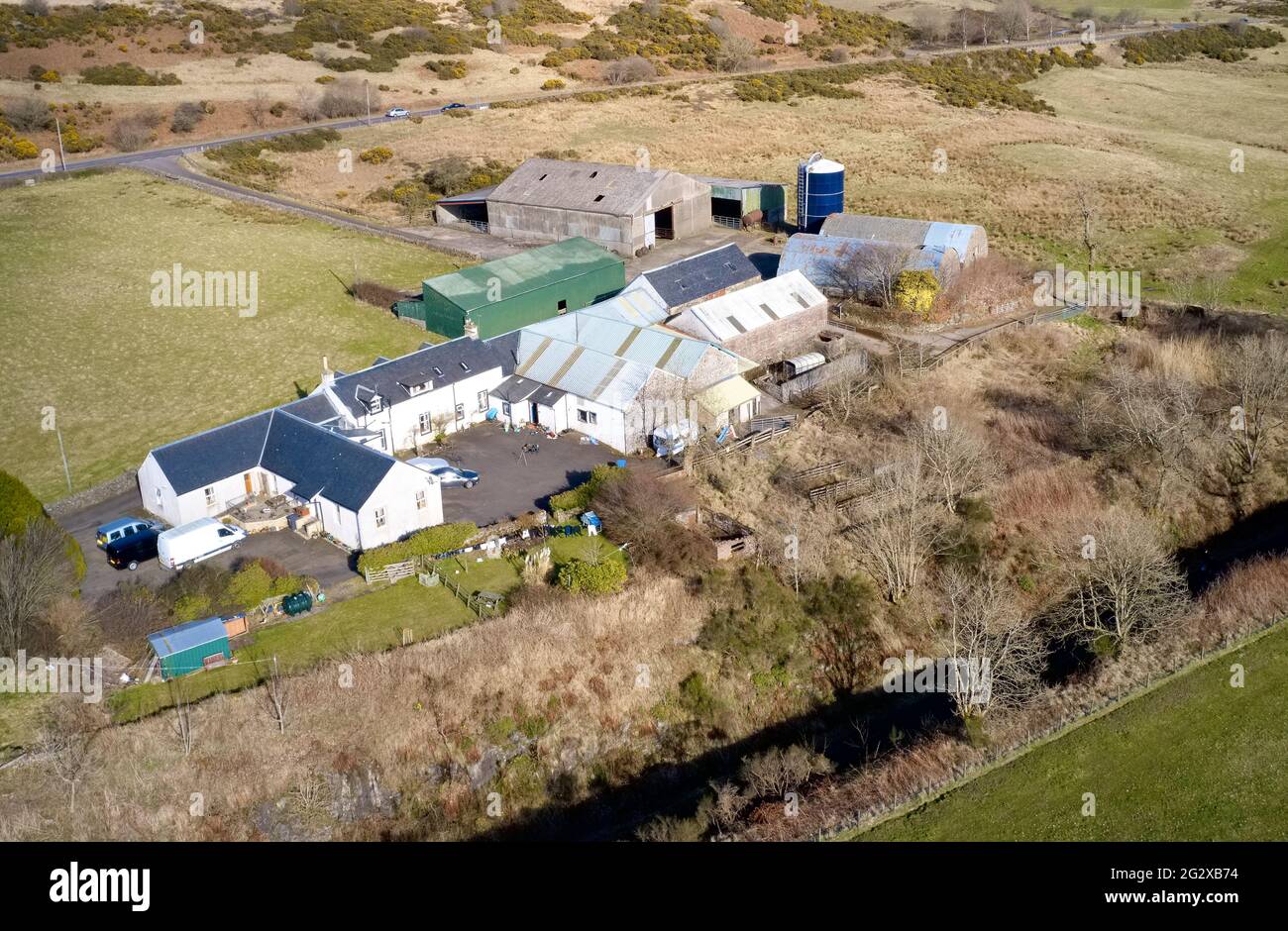 Farm and farmyard buildings in rural countryside aerial view from above Stock Photo