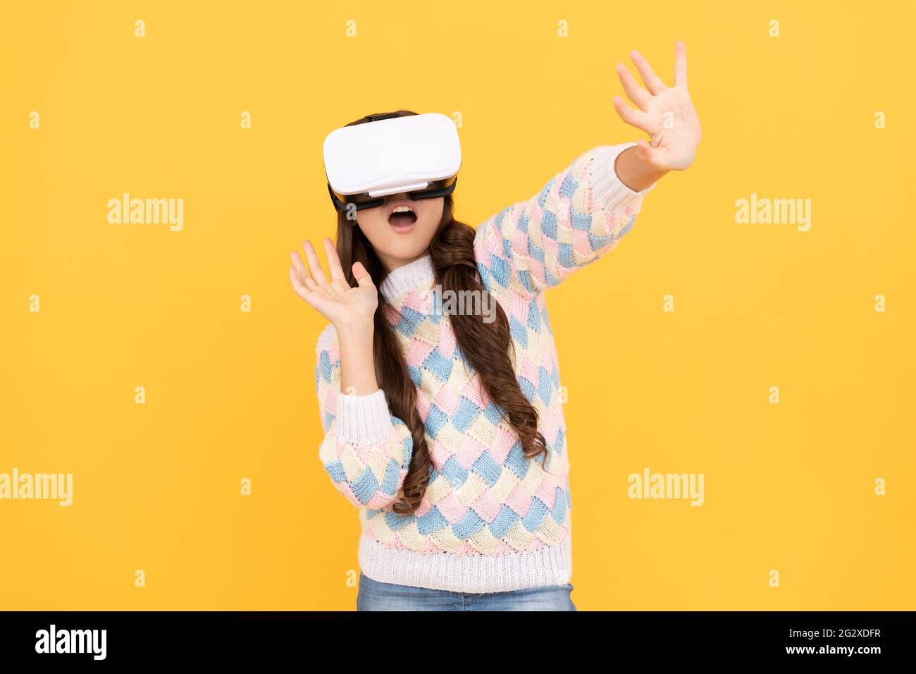 happy teen girl wear vr glasses using future technology for education