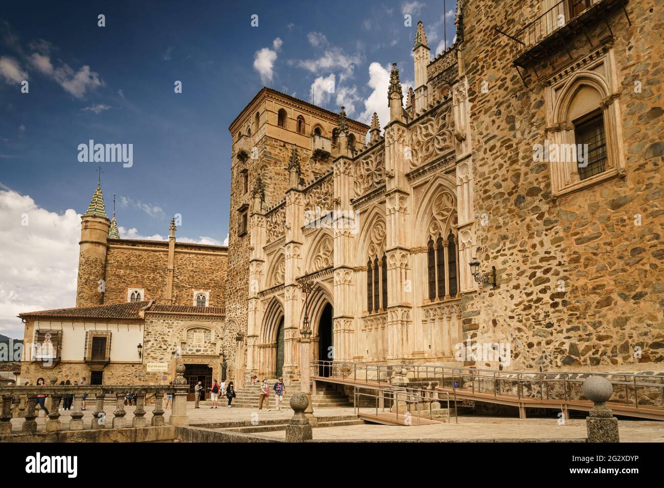 Main facade of the Mudejar Gothic Monastery of Guadalupe in Spain. World heritage Stock Photo