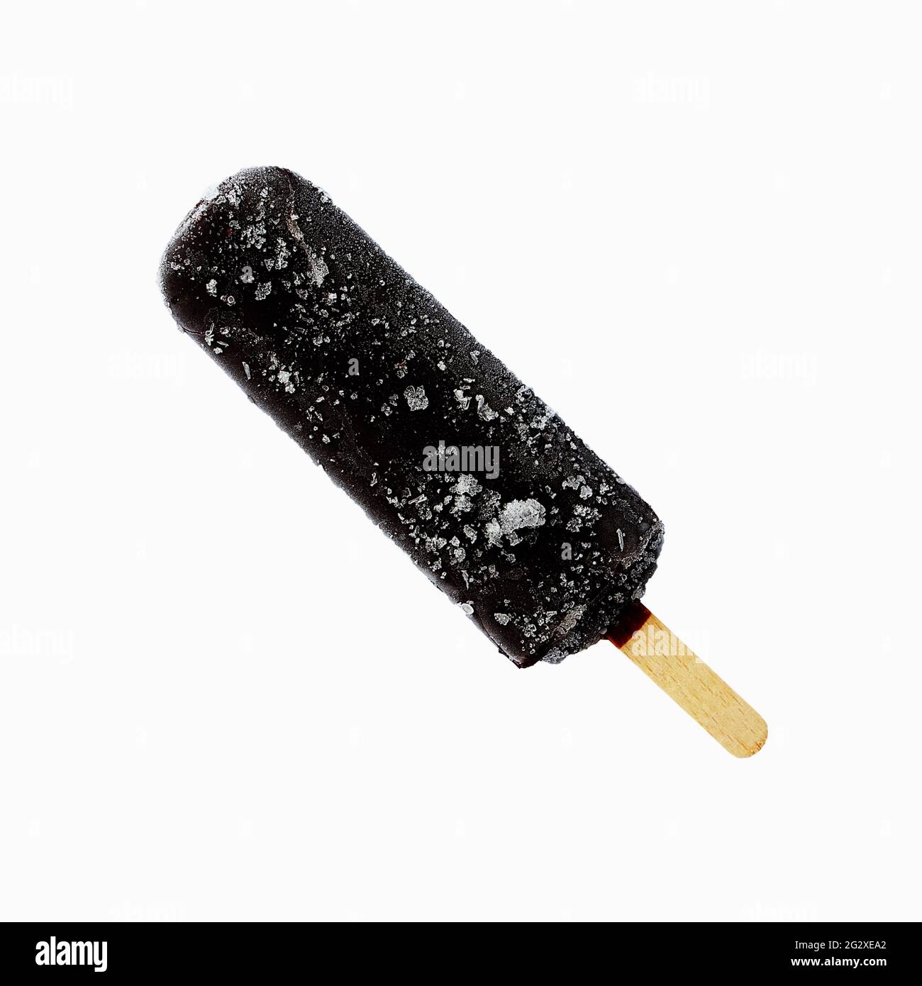 Chocolate ice cream lolly, chocolate glaze close-up on the white isolated background. Ice cream bar,summer hot day. Cold yummy ice cream. Ice lolly. Stock Photo