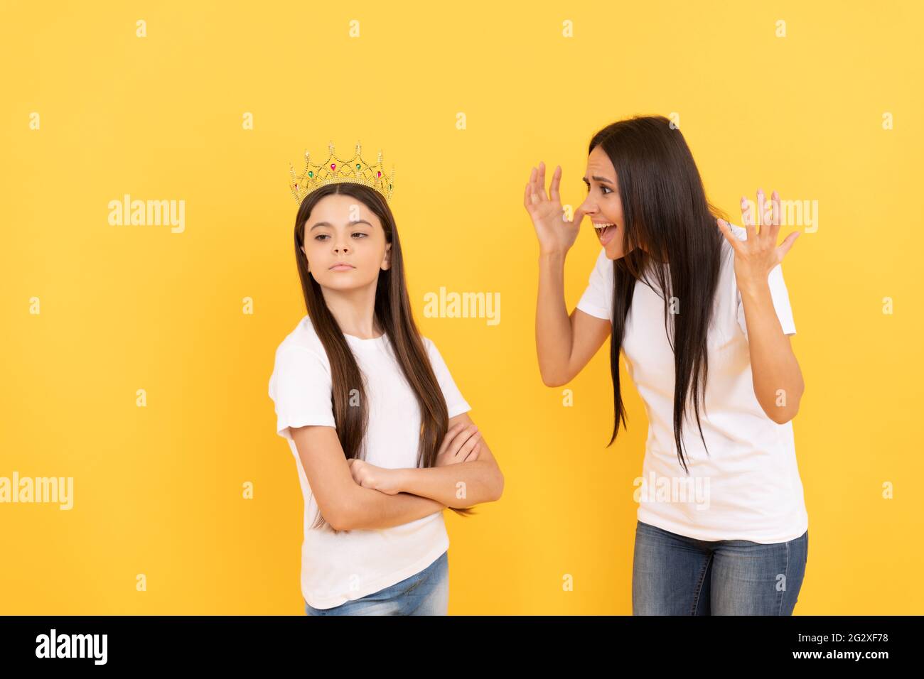 mother raise naughty daughter. childhood and motherhood. concept of friendship. Stock Photo