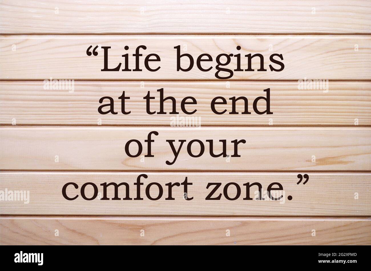 Life begins at the end of your comfort zone, quotes.Comfort zone concept. Motivational and inspirational quote for success, life, uplifting, education. Stock Photo