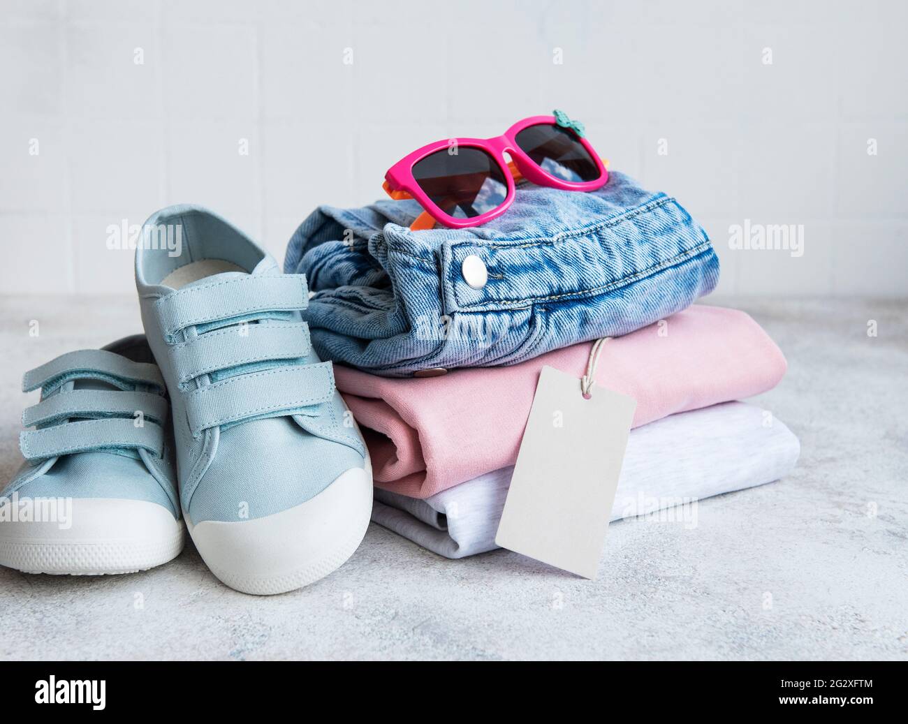 Clothes for kids. Online shopping concept. Delivery of clothes Stock