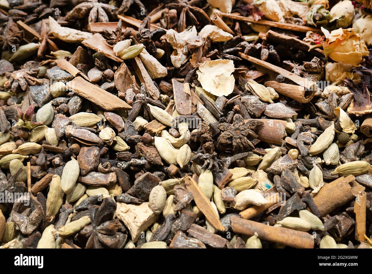 Texture of dry herbal tea with spices and fruits (hibiscus, star anise