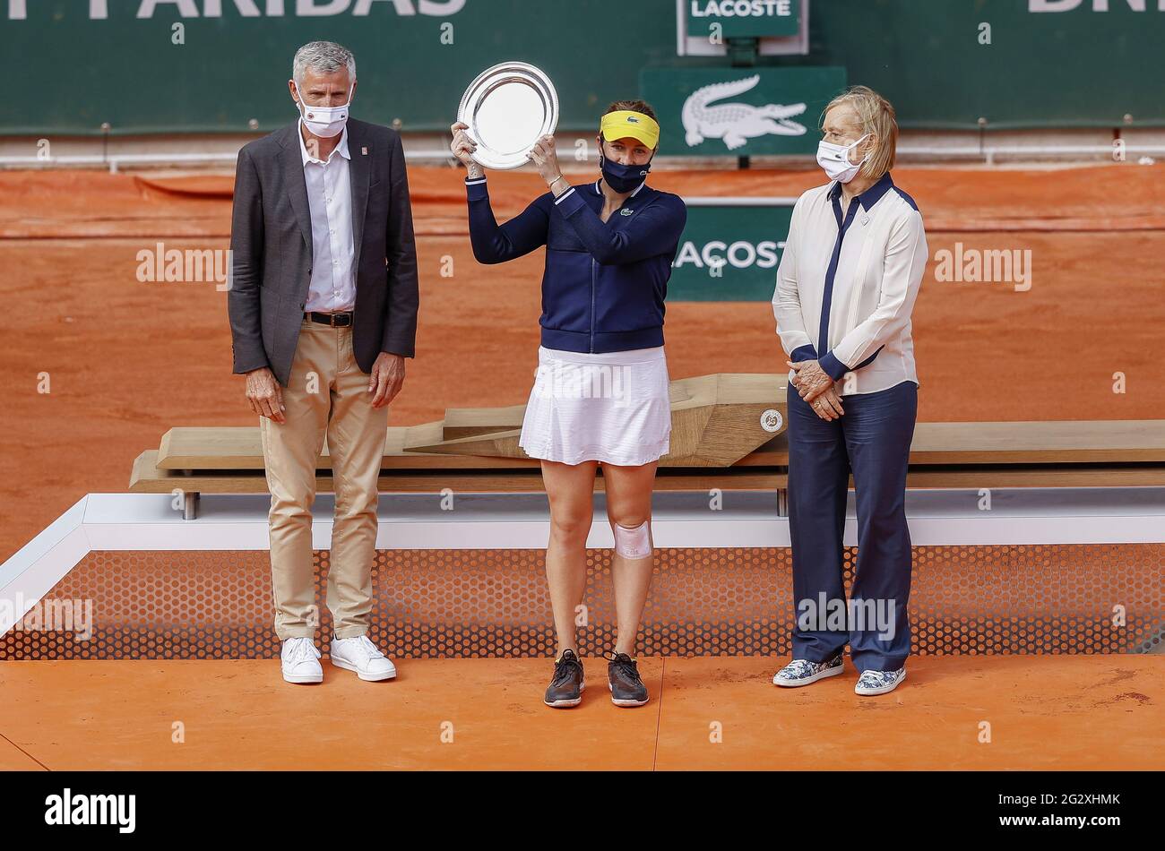 Paris, France. 12th June, 2021. Gilles Moretton (Pdt FFT), Anastasia  Pavlyuchenkova of Russia with the runner-up trophy, Martina Navratilova at  the women's trophy ceremony during the Roland-Garros 2021, Grand Slam tennis  tournament