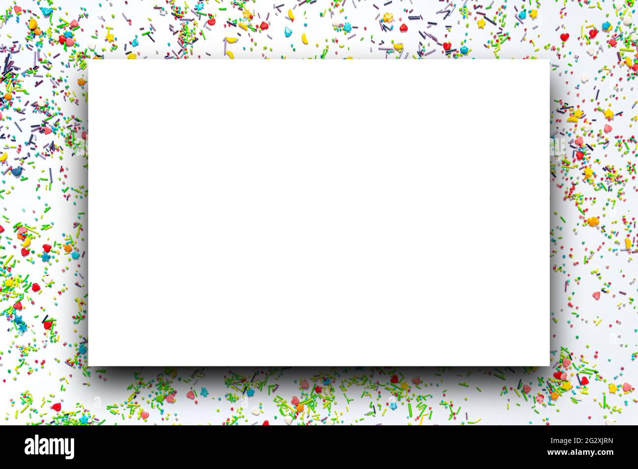 Isolated White Frame With Shadow On The Background Of Multi Colored Sweet Sprinkles Of Different Shapes In The Form Of Hearts Stars Moon Flowers R Stock Photo Alamy