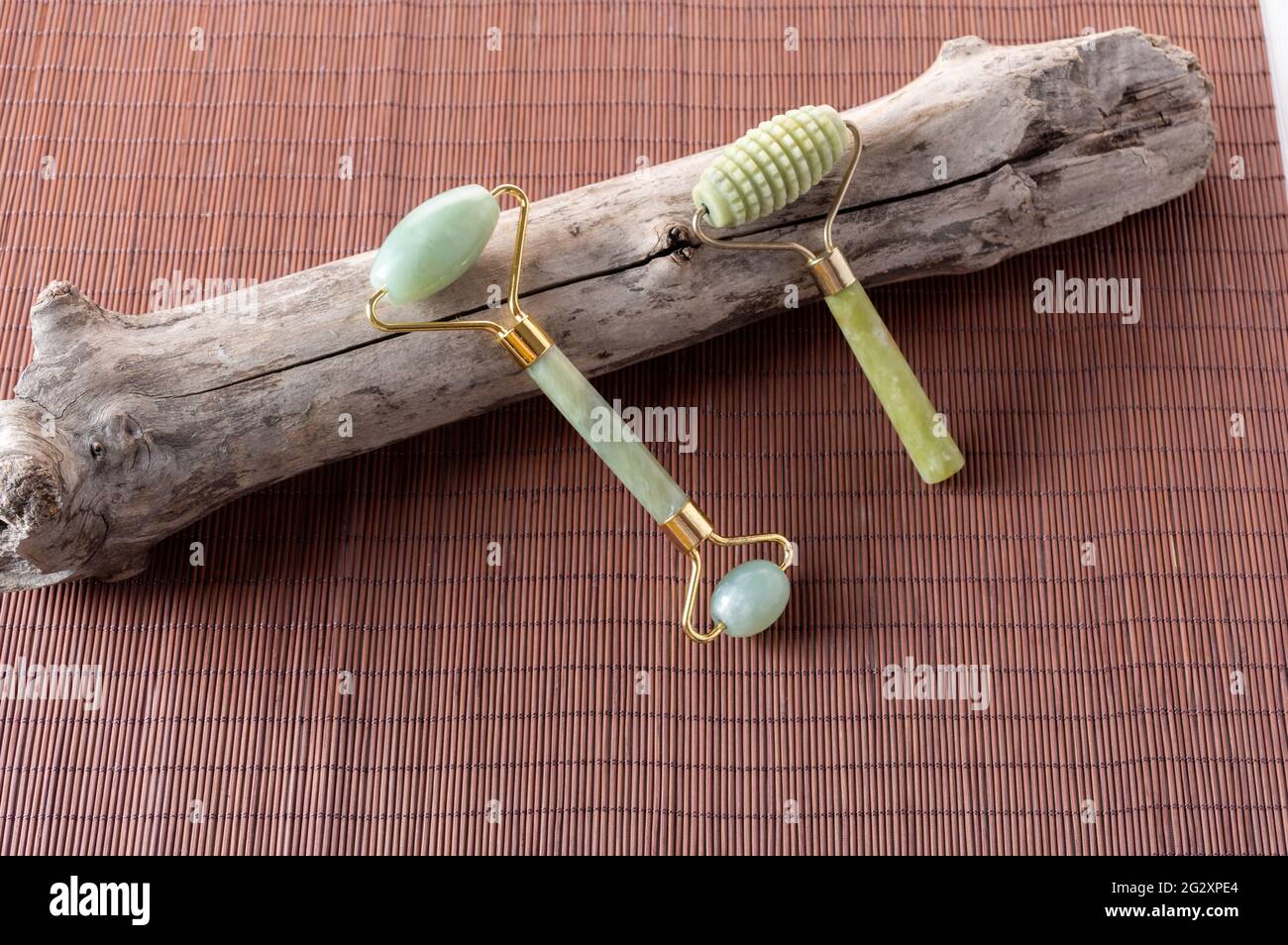 Two massage rollers for the skin. Massage rollers on dry wood and