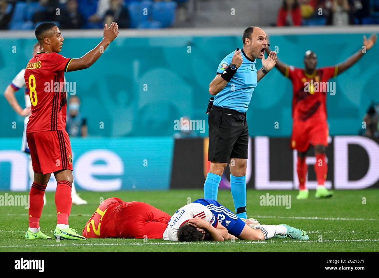 Belgium's Youri Tielemans, Belgium's Timothy Castagne, Russian Daler Kuzyayev and Referee Spanish Antonio Mateu Lahoz pictured during a soccer game be Stock Photo
