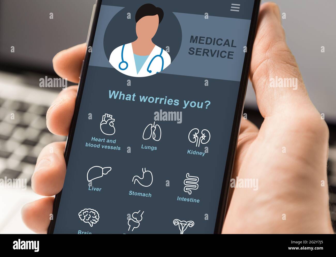 Male hand holding smartphone with telemedicine app on screen Stock ...
