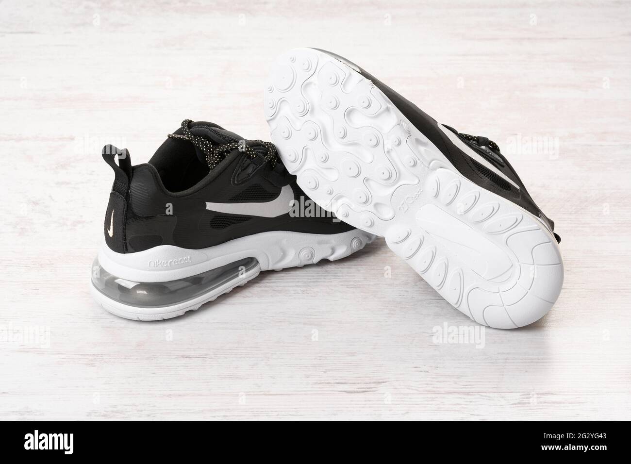 BURGAS, BULGARIA - DECEMBER 8, 2020: Nike Air MAX 270 REACT women's shoes -  sneakers in black on white wooden background. Nike is a global sports clot  Stock Photo - Alamy