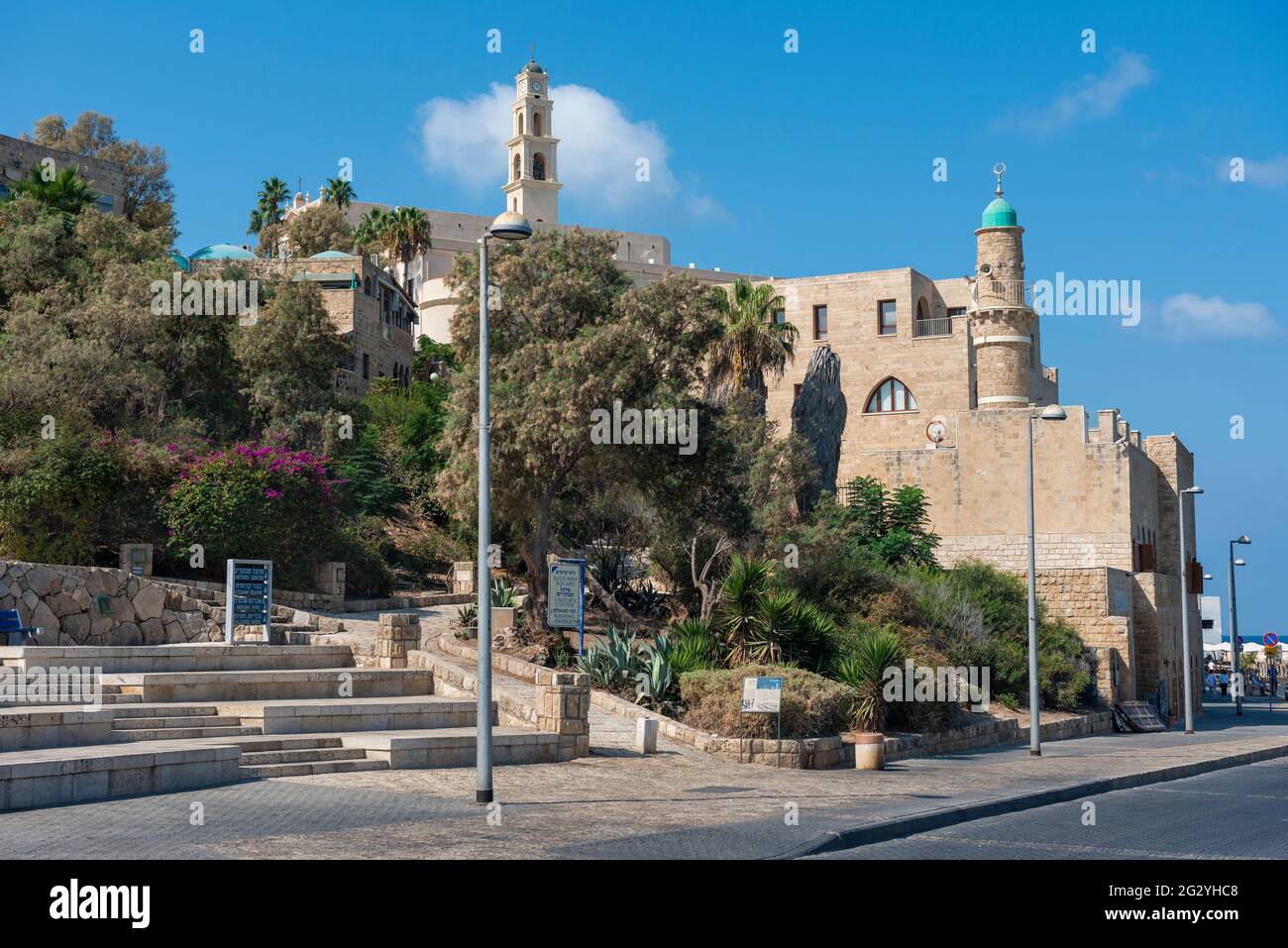 View of the Al-Bahr Mosque or Sea Mosque, minaret of the mosque in Old Jaffa, ancient port of Jaffa, Mediterranean Sea coast in Tel Aviv Yaffo, Israel Stock Photo
