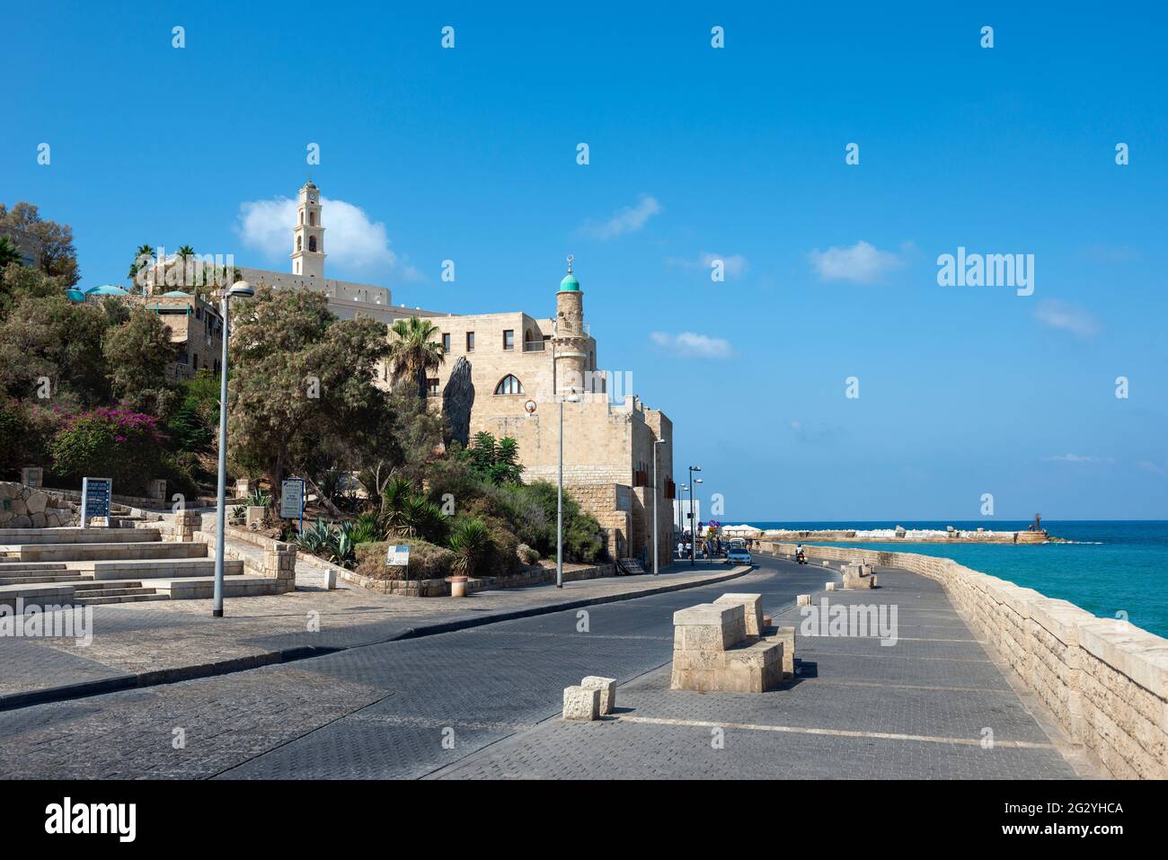 View of the Al-Bahr Mosque or Sea Mosque, minaret of the mosque in Old Jaffa, ancient port of Jaffa, Mediterranean Sea coast in Tel Aviv Yaffo, Israel Stock Photo