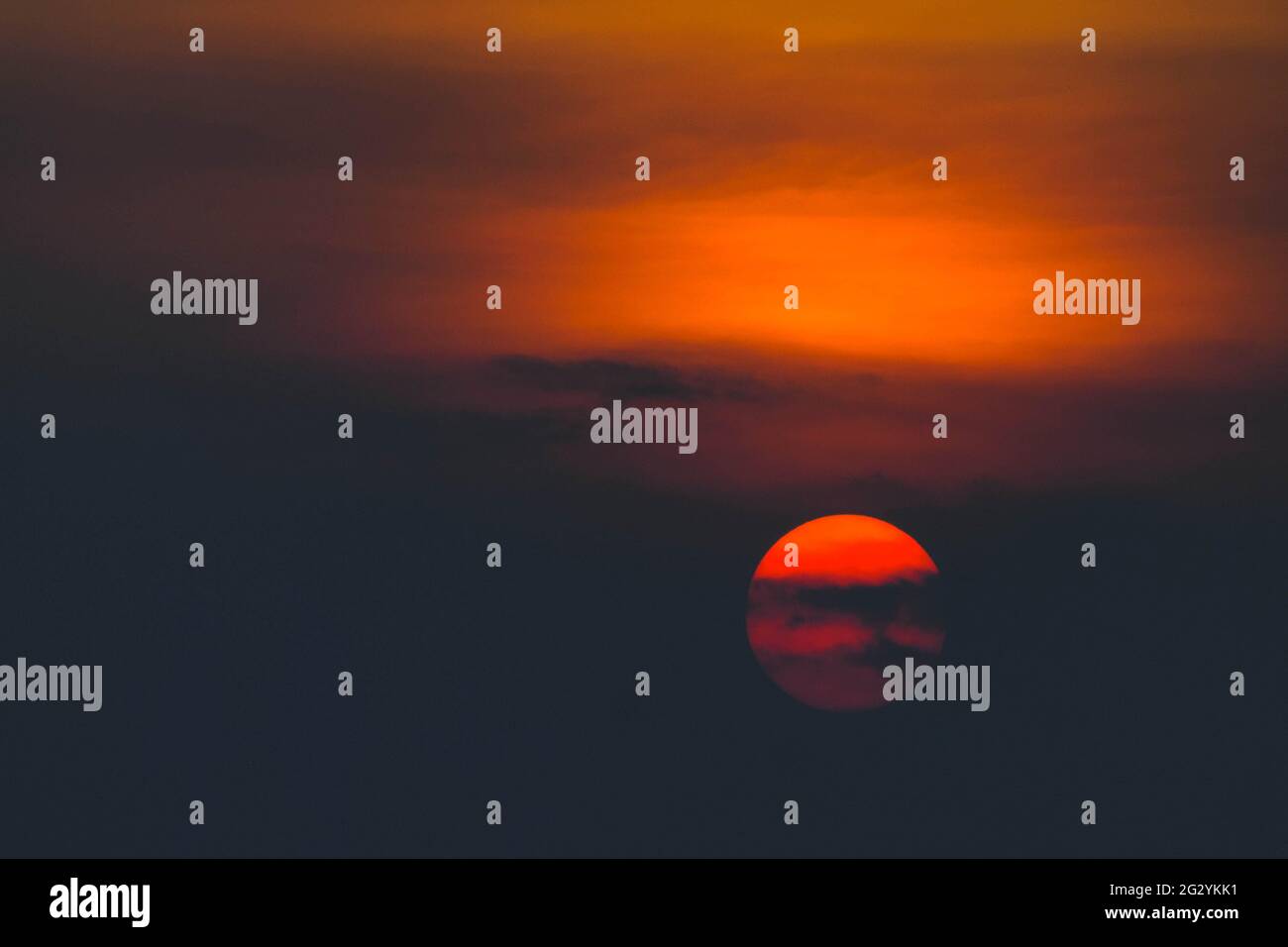 Fiery orange clouds during dramatic hi-res stock photography and images ...