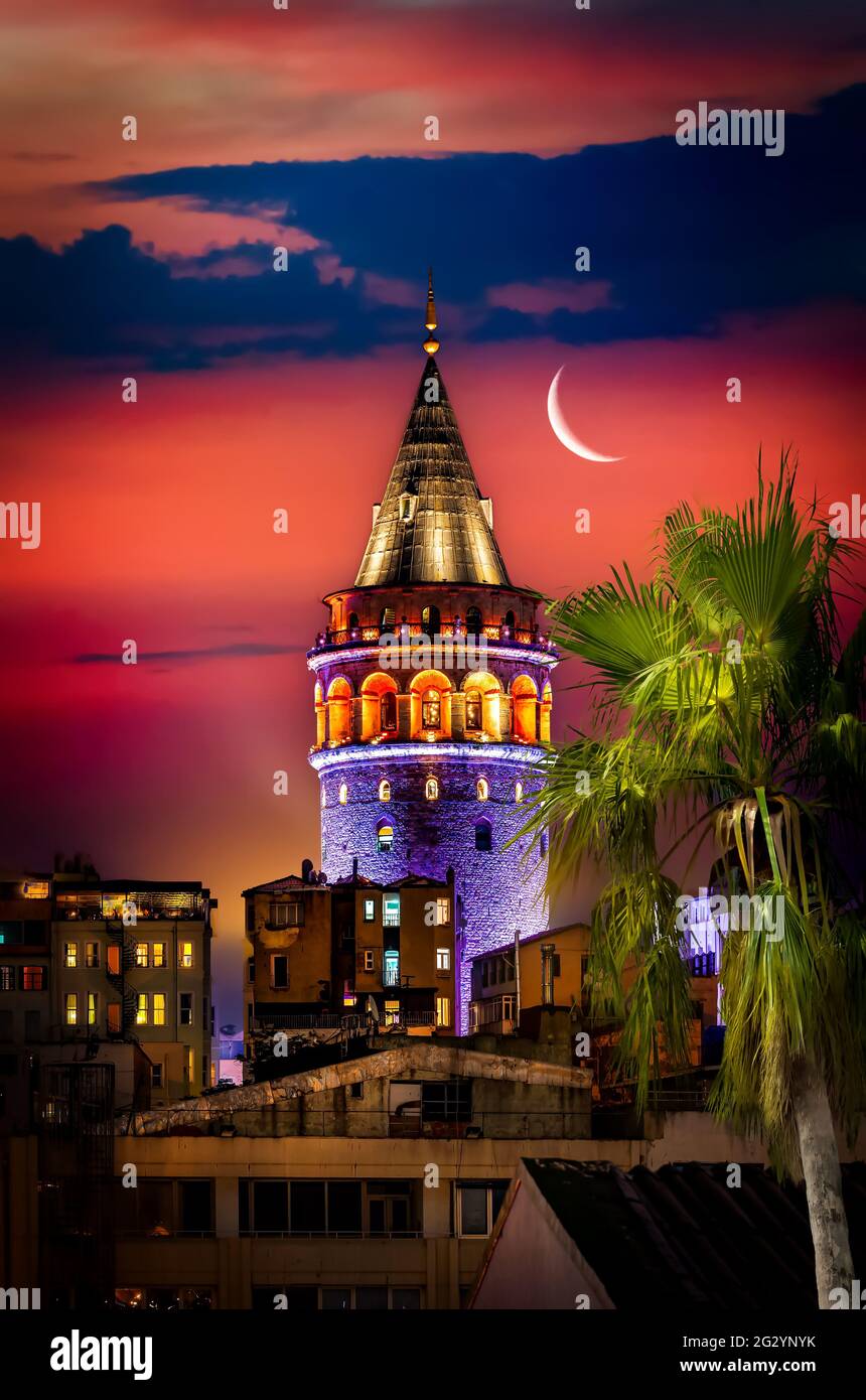 Illuminated Galata Tower in Istanbul at night, Turkey Stock Photo