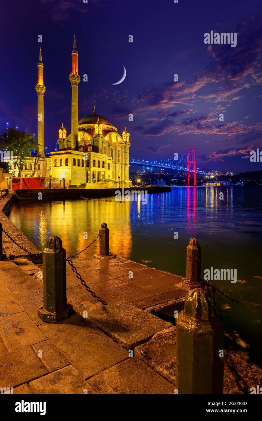 Ortakoy Mosque and Bosphorus bridge in Istanbul at sunrise, Turkey Stock Photo