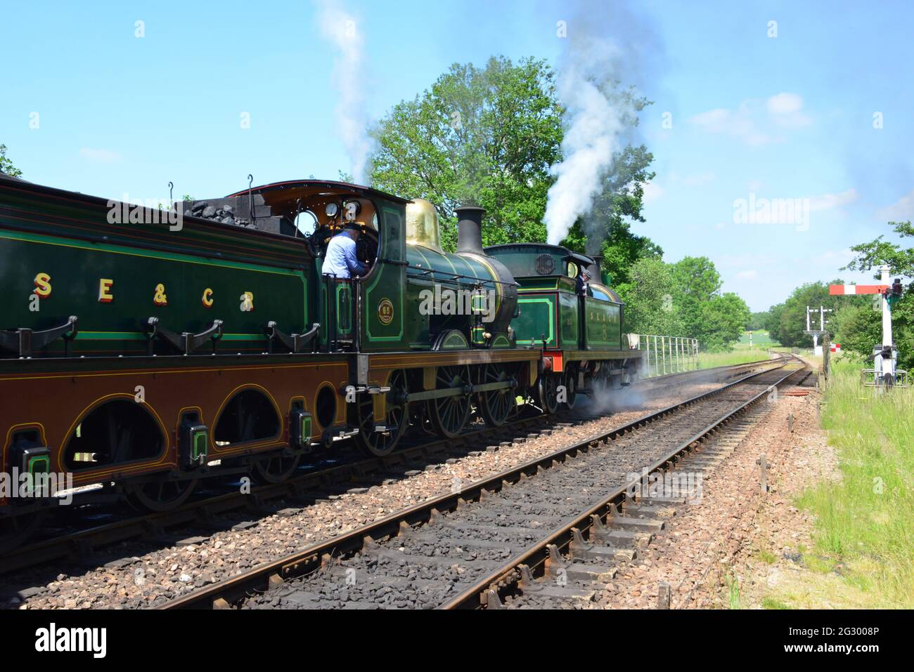 a-double-header-of-two-steam-locomotives-on-a-heritage-railway-in-the