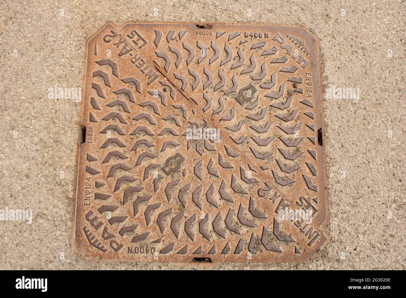 Square iron manhole cover, PAM Inter-Ax 2 manhole cover Stock Photo
