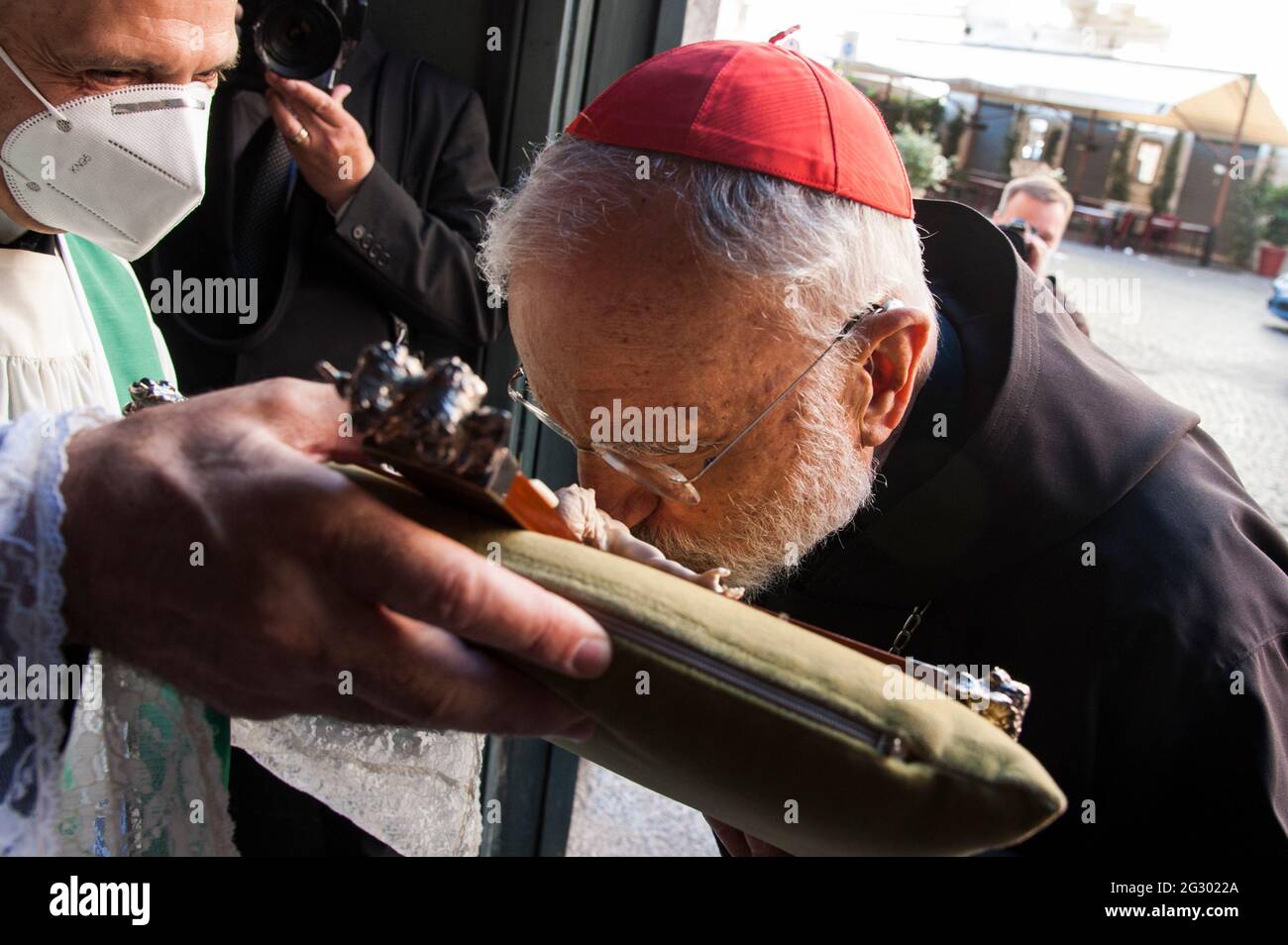 June 13, 2021 Card. Raniero Cantalamessa, kisses the crucifix as he