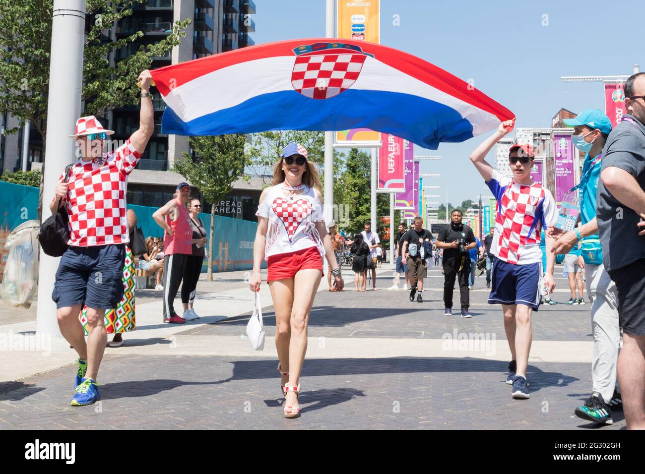 Wembley Stadium, Wembley Park, UK. 13th June 2021.  Croatia fan enjoying the sunshine on Olympic Way ahead of England vs Croatia, Wembley Stadiums first match of of the UEFA European Football Championship.  Amanda Rose/Alamy Live News Stock Photo