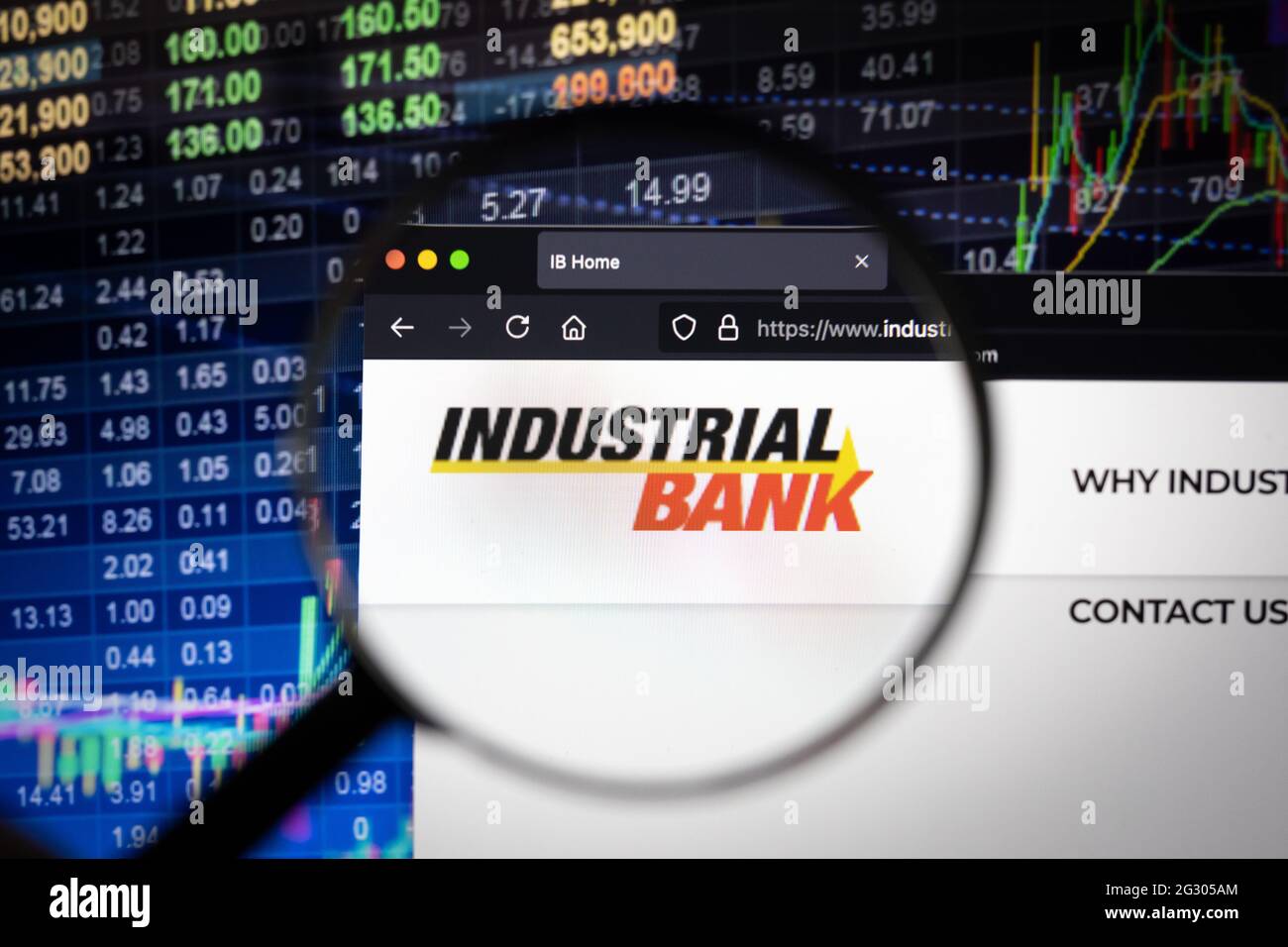 Industrial Bank company logo on a website with blurry stock market