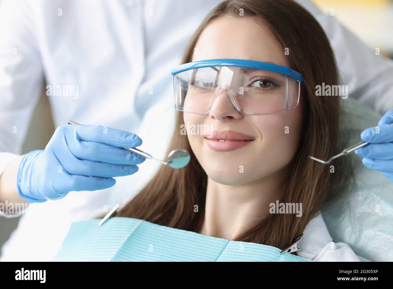 Portrait of beautiful woman at dentist appointment Stock Photo