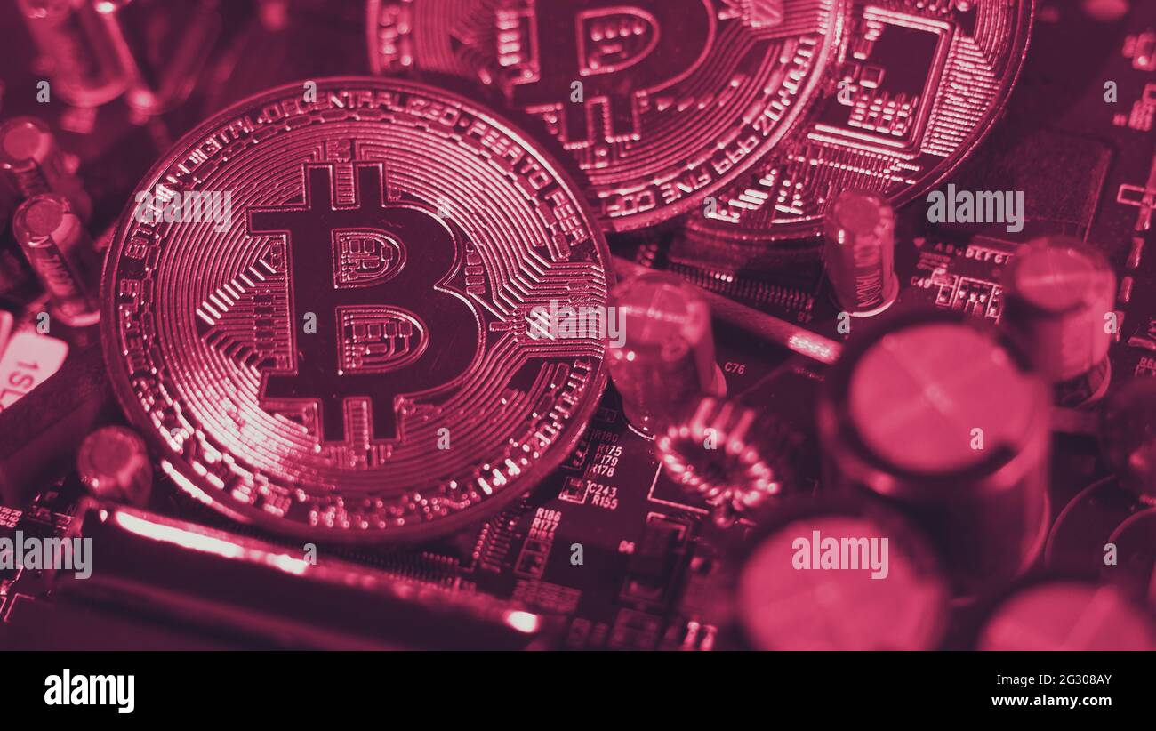 Bitcoin and semiconductor. Represent mining in Cryptocurrency cause global  warming. Bitcoins on CPU board. Close-up Bitcoin with blue and pink light  Stock Photo - Alamy