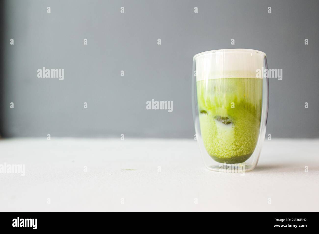 Matcha green tea with ice cubes Stock Photo