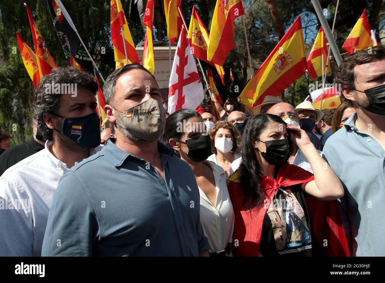 Madrid, Spain; 13.06.2021.- Santiago Abascal (L) leader of Vox the politician with the greatest presence in the demonstration in the Plaza de Colon, at the monument to the Spanish admiral Blas de Lezo, who was one-eyed, lame and one-eyed. 'Unión 78' platform led by the Spanish politician Rosa Díez, the group that convened the meeting of the far-right in the Plaza de Colón in Madrid, to protest the possible pardons to the imprisoned Catalan independence politicians. Among thousands of people who filled the square and the adjacent streets with Spanish flags, the attendees shouted slogans such as Stock Photo