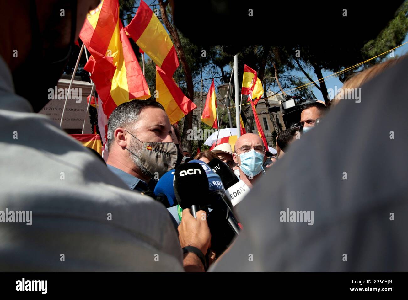Madrid, Spain; 13.06.2021.- Santiago Abascal leader of Vox the politician with the greatest presence in the demonstration in the Plaza de Colon, at the monument to the Spanish admiral Blas de Lezo, who was one-eyed, lame and one-eyed. 'Unión 78' platform led by the Spanish politician Rosa Díez, the group that convened the meeting of the far-right in the Plaza de Colón in Madrid, to protest the possible pardons to the imprisoned Catalan independence politicians. Among thousands of people who filled the square and the adjacent streets with Spanish flags, the attendees shouted slogans such as 'Ma Stock Photo