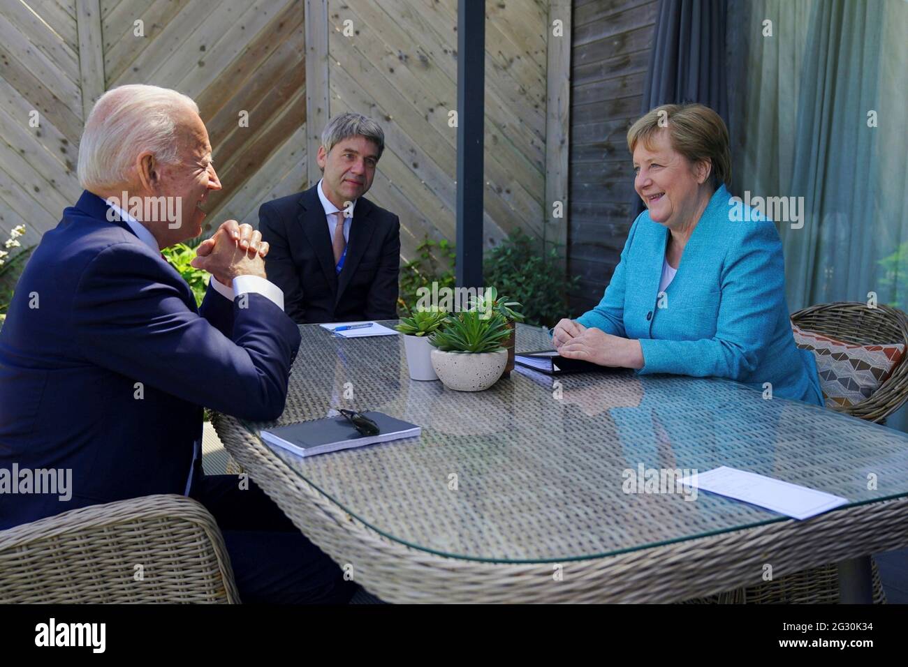 U.S President Joe Biden during a bilateral meeting with German Chancellor Angela Merkel, right, on the sidelines at the G7 Summit at the Carbis Bay Hotel, June 12, 2021 in Carbis Bay, Cornwall, United Kingdom. Stock Photo