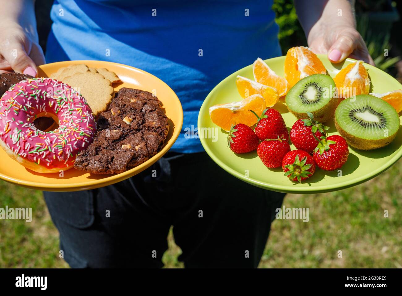 Healthy and unhealthy. Sugar in fruit and cookies. Concept, Good
