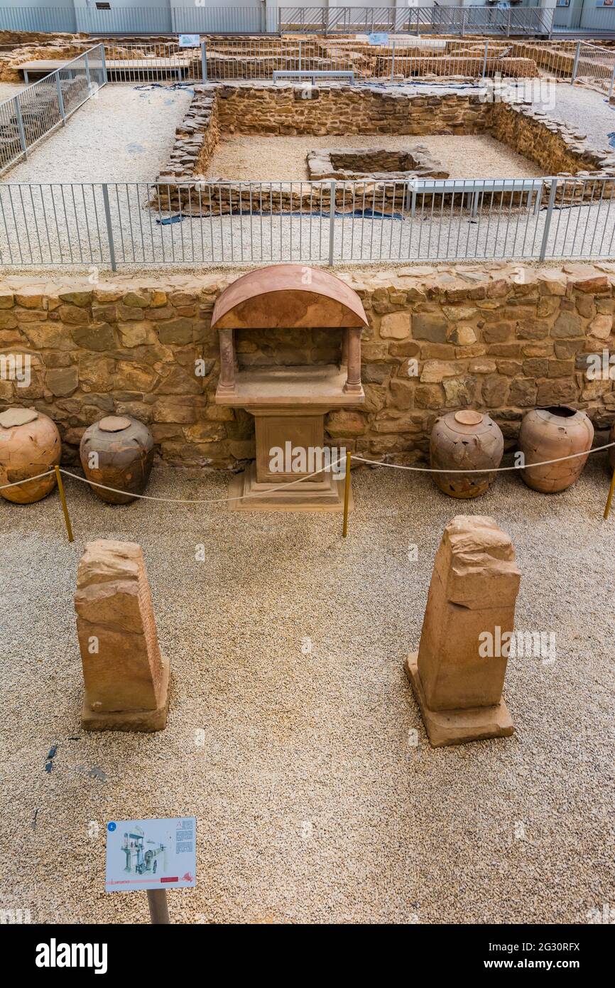 Stone altar, which recalls the combination of activities dedicated to the production of wine and religious celebrations. 'Cella Vinaria' or winery. Vi Stock Photo