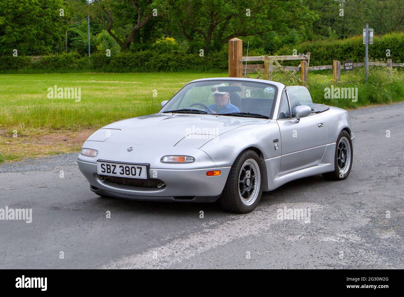 1990 silver Mazda 1 5 speed manual at the 58th Annual Manchester to Blackpool Vintage & Classic Car Run The event is a ‘Touring Assembly’ Stock Photo